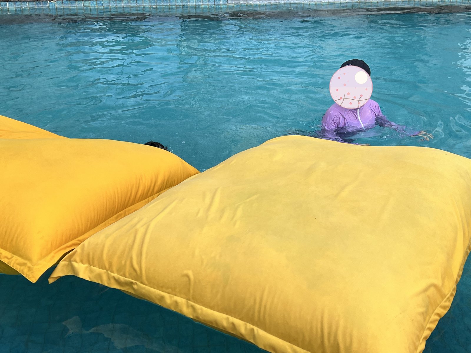 A large bean-bag float in the pool 