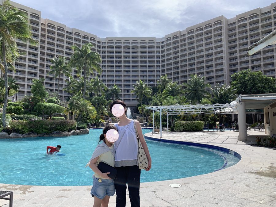 Walking the poolside together.