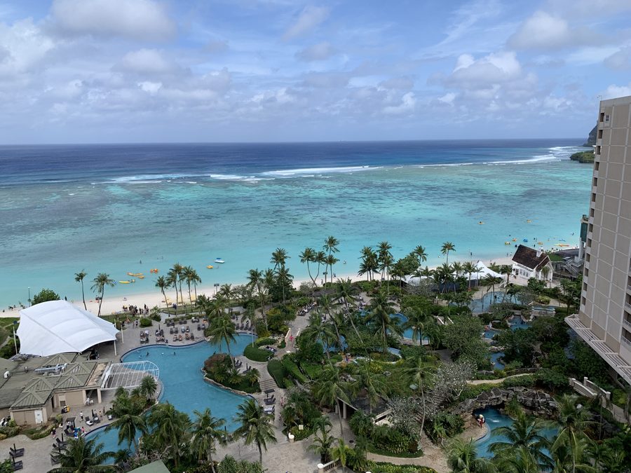 The view from the room — the pool, and the ocean beyond it.
