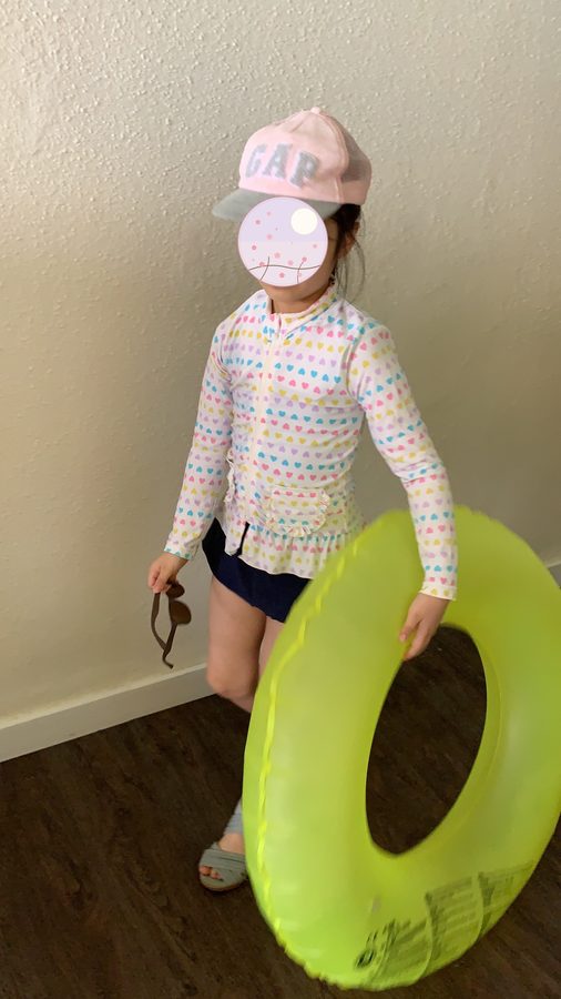 Carrying the green float around the room.