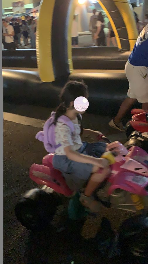 On a ride at the night market.