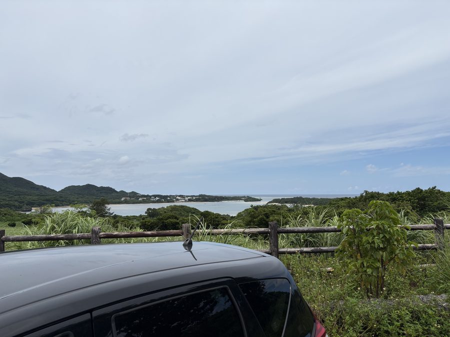 Kabira Bay beyond the roof of our rental car at the lookout