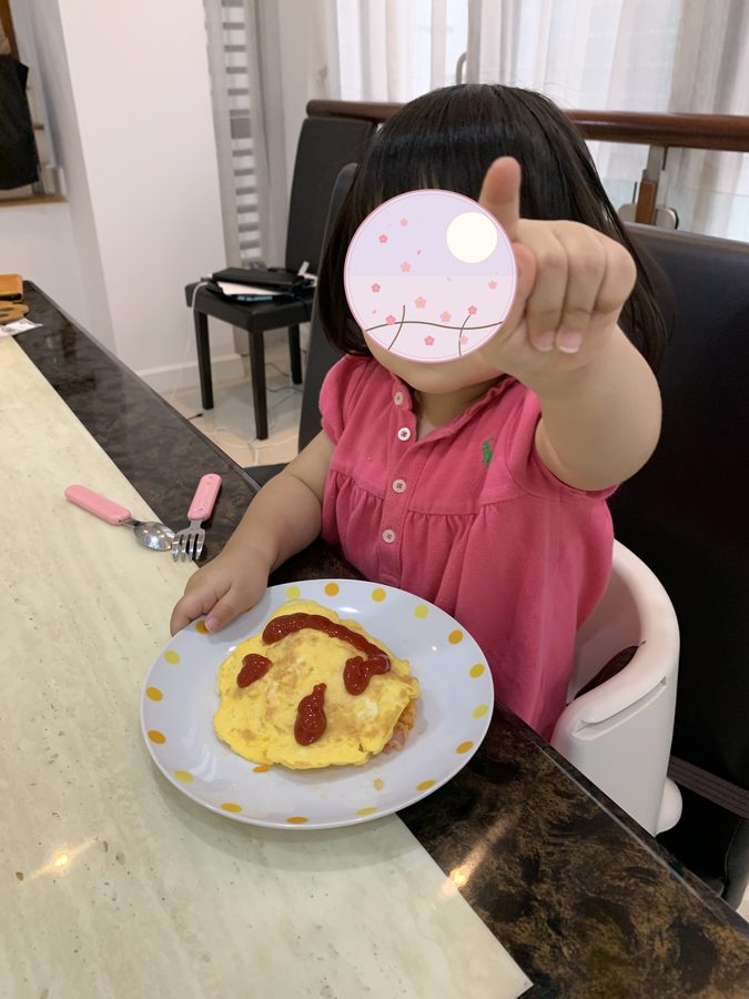 The peace sign had become second nature by now.