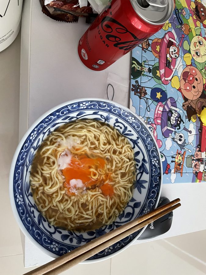 Noodles eaten outdoors — we started eating in the garden more often.
