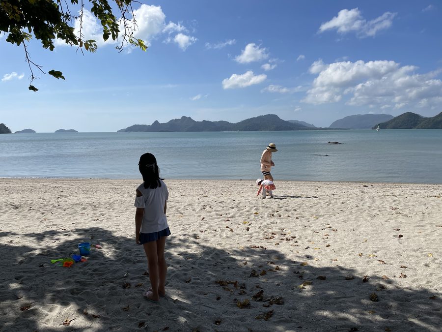Walking the beach — quiet, with hardly anyone else around.