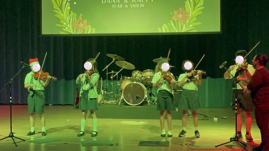 Drums and percussion joined in — an ensemble spanning several year groups.
