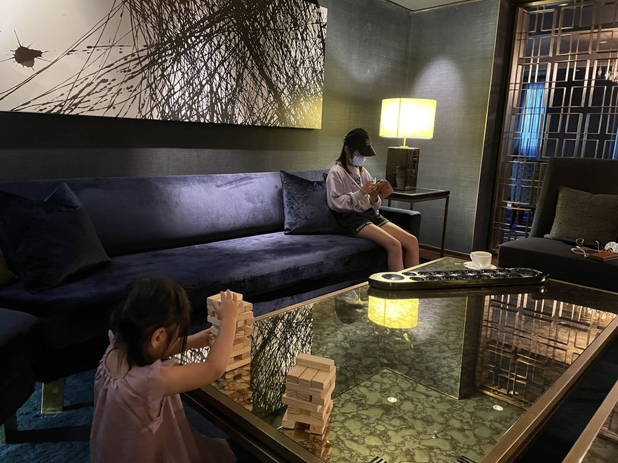 Jenga in the lobby — a slow, end-of-year kind of evening.