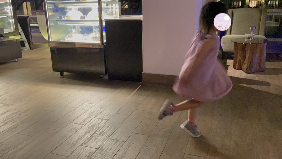 Spinning around in a hotel lobby, just for fun.