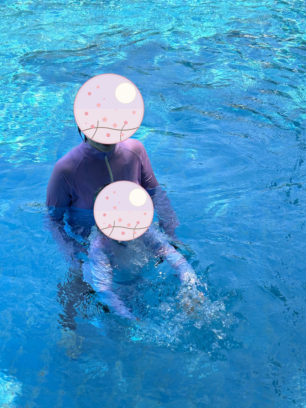 Swimming in the pool with pink goggles 