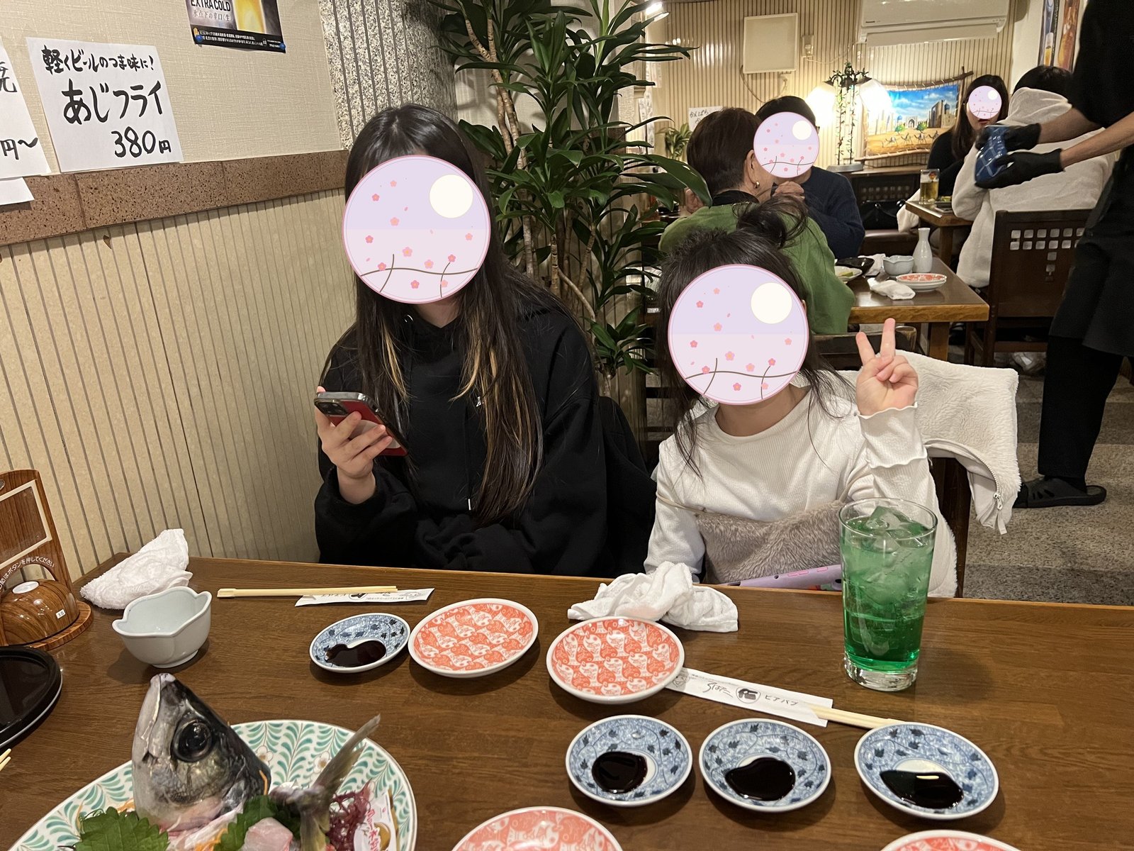 The kids enjoying dinner