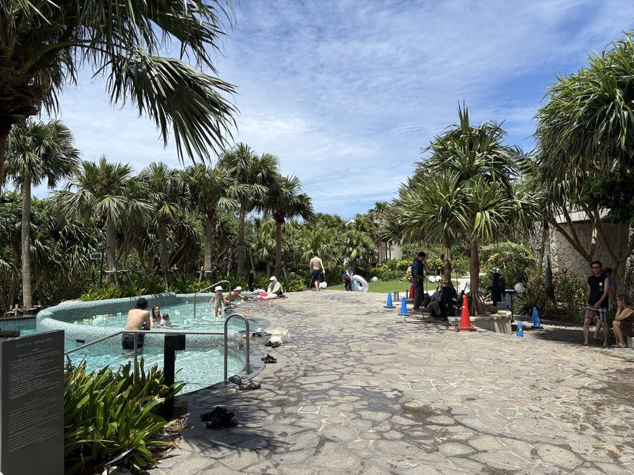The outdoor pools run straight into the beach