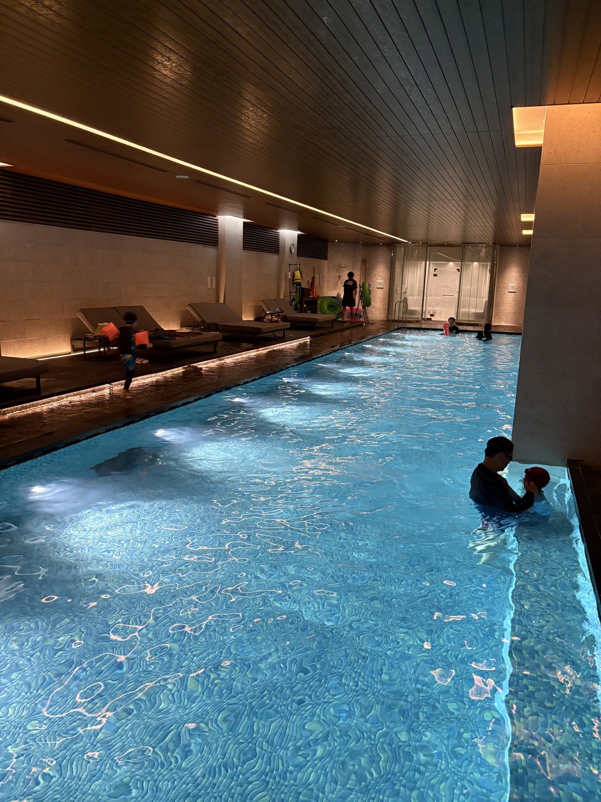 The indoor pool at night — quiet, and almost empty