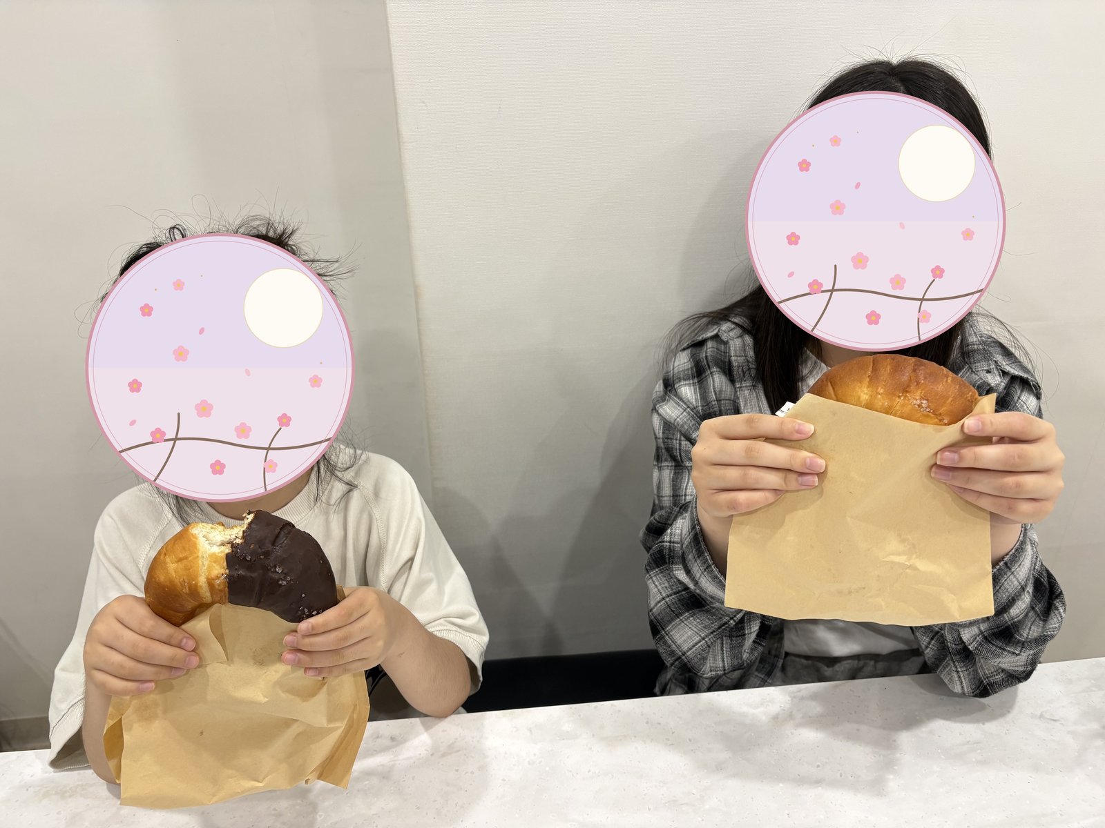 The kids eating pastries we bought at the bakery